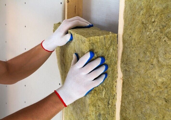 Installng-rock-wool-insulation-1